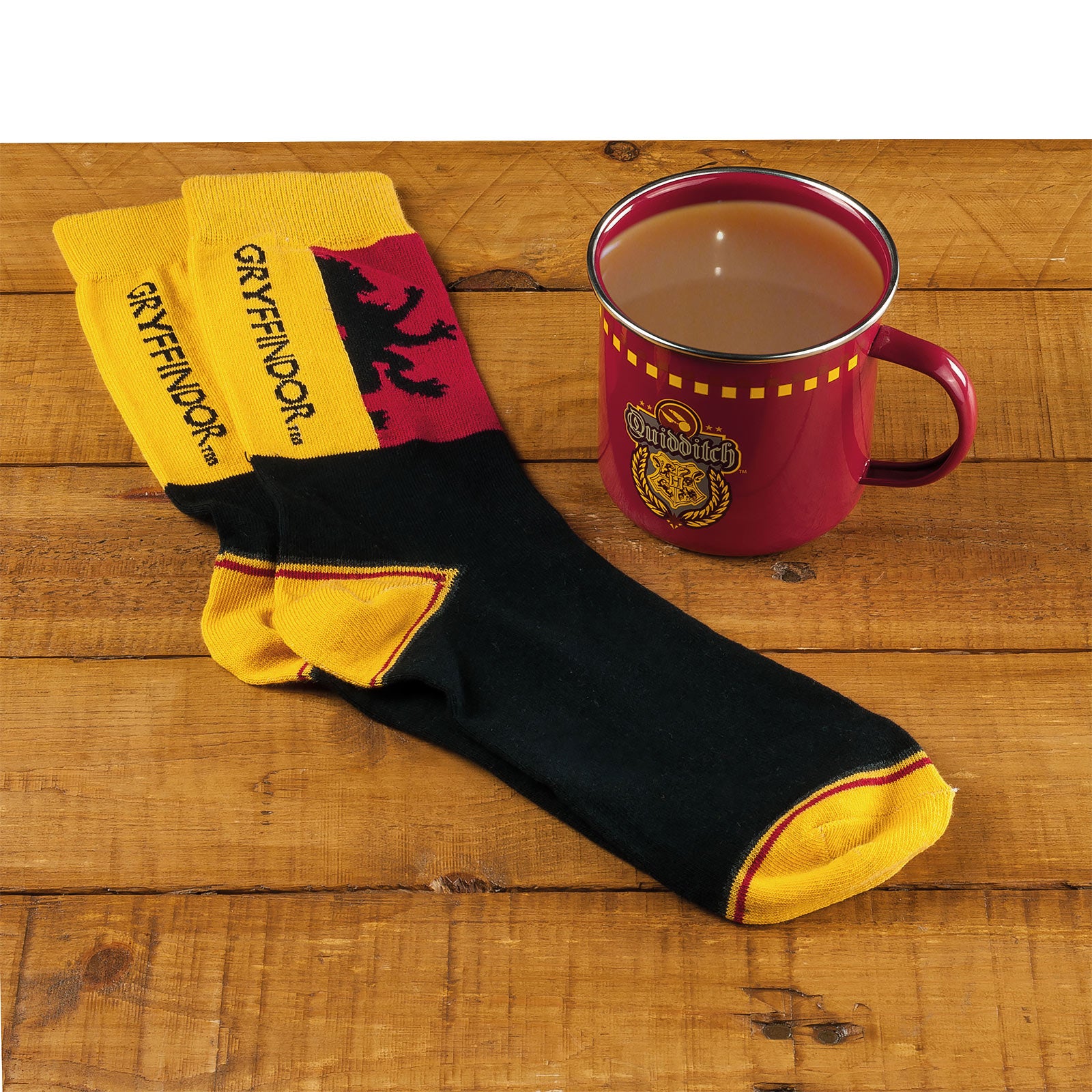 Imagen del producto Harry Potter - Calcetines Quidditch de Gryffindor y Taza de Esmalte