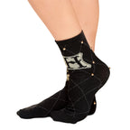 Imagen del producto Harry Potter - Calcetines con tachuelas y logo de Hogwarts negro
