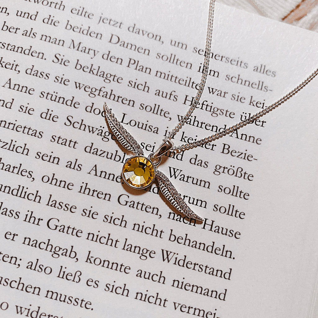 Imagen del producto Harry Potter - Collar Snitch dorada con cristal