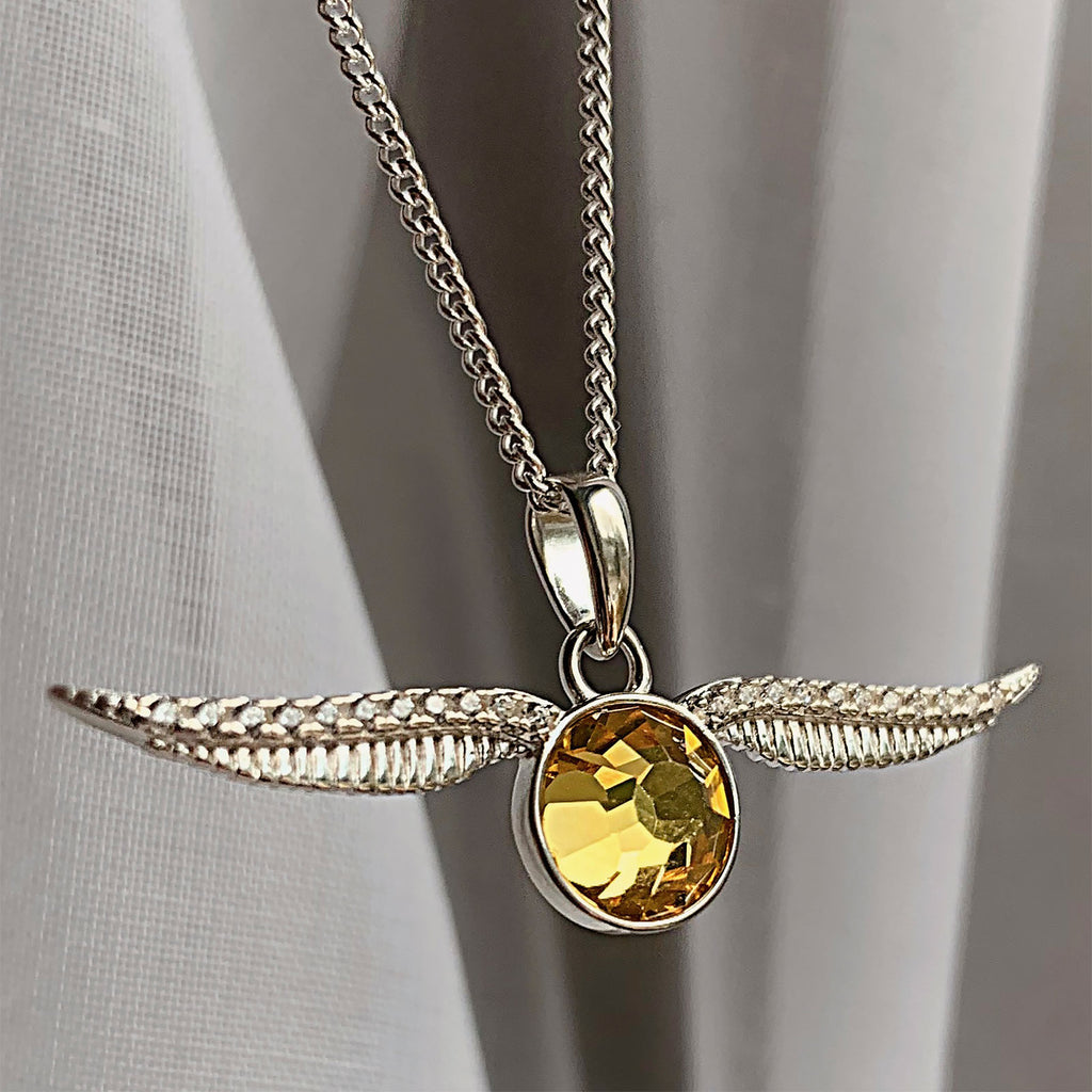 Imagen del producto Harry Potter - Collar Snitch dorada con cristal