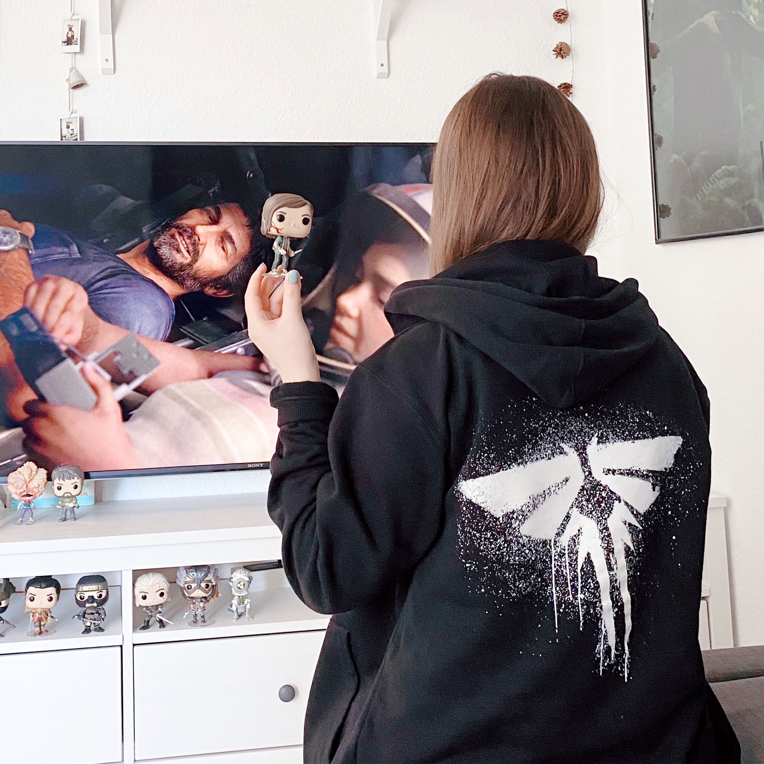 Imagen del producto The Last of Us - Sudadera con capucha y logo de Fireflies negro