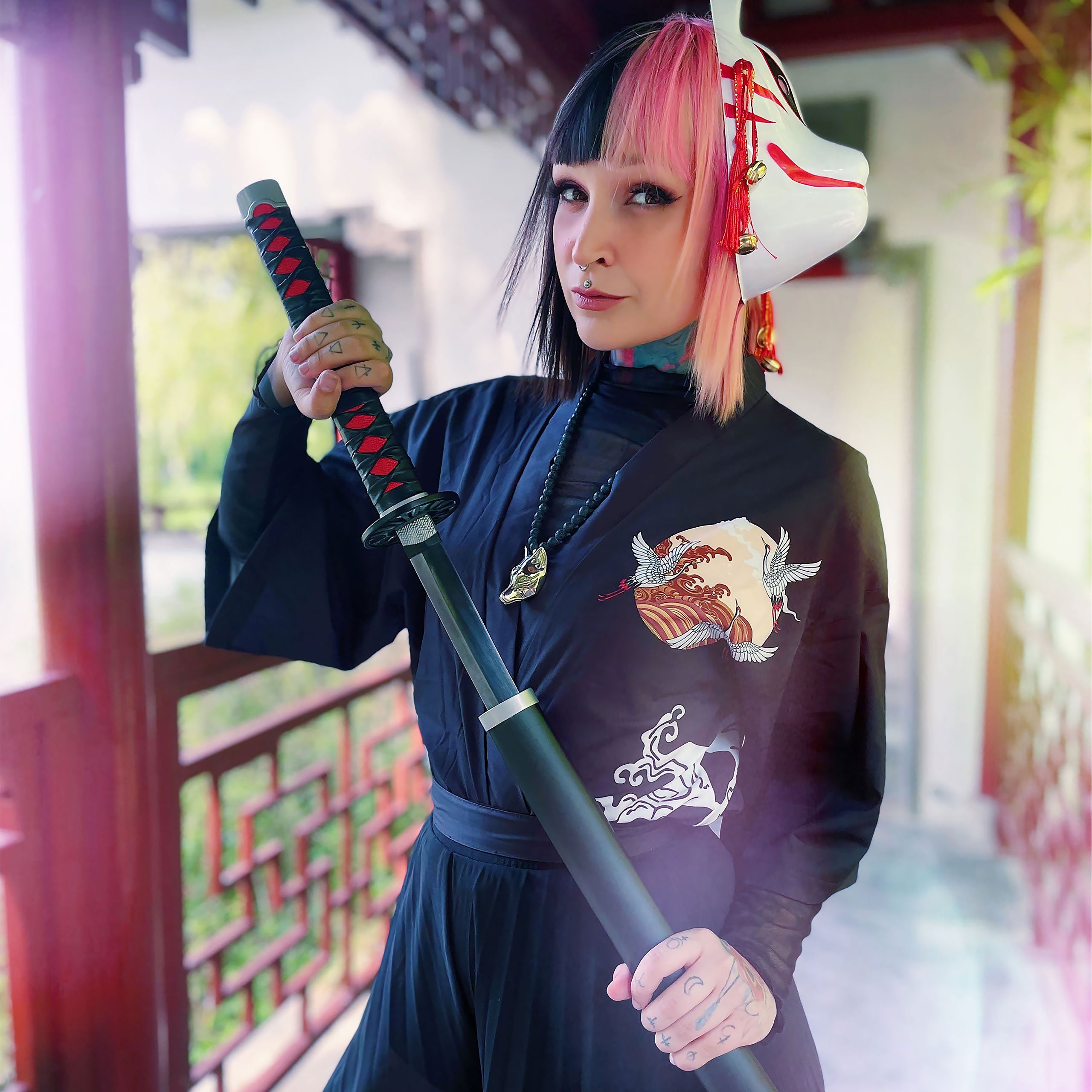 Imagen del producto Réplica de la Katana de Tanjiro Kamado con vaina para fans de Guardianes de la Noche