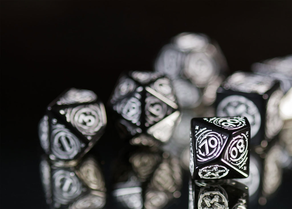 Product image Witcher - Yennefer Obsidian Star RPG Dice Set 7pcs with Collector's Coin