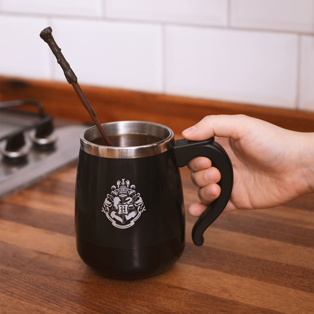 Imagen del producto Harry Potter - Taza de Hogwarts con función de agitación y varita mágica