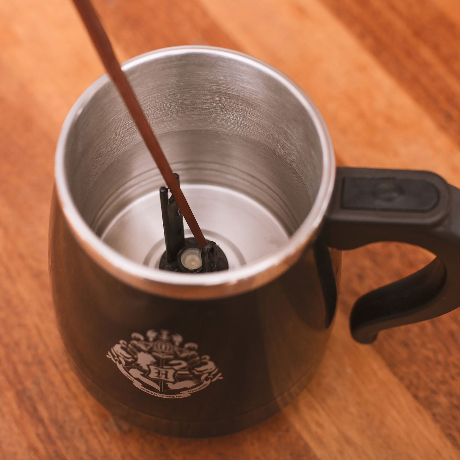 Imagen del producto Harry Potter - Taza de Hogwarts con función de agitación y varita mágica