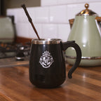 Imagen del producto Harry Potter - Taza de Hogwarts con función de agitación y varita mágica