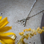 Imagen del producto Harry Potter - Colgante de las Reliquias de la Muerte con cadena