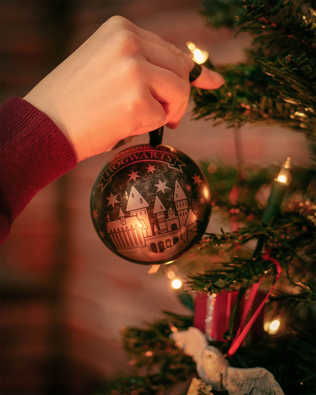 Imagen del producto Harry Potter - Bola de Navidad de Hogwarts con Set de Pendientes