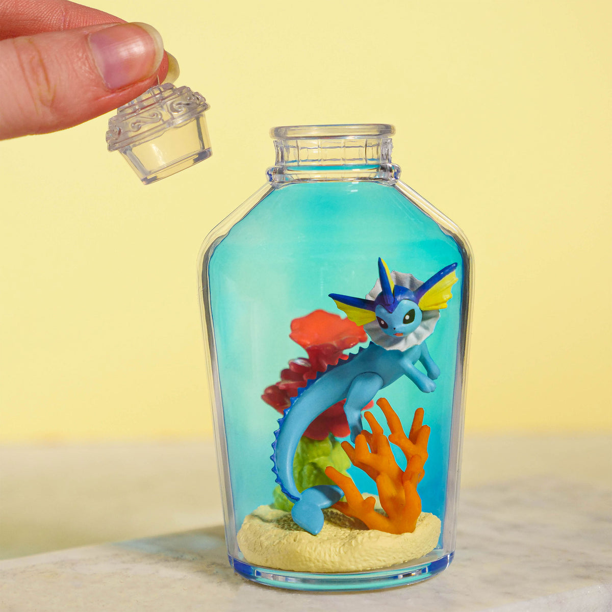 Imagen del producto Pokemon - Figura Misteriosa de Botella Aqua
