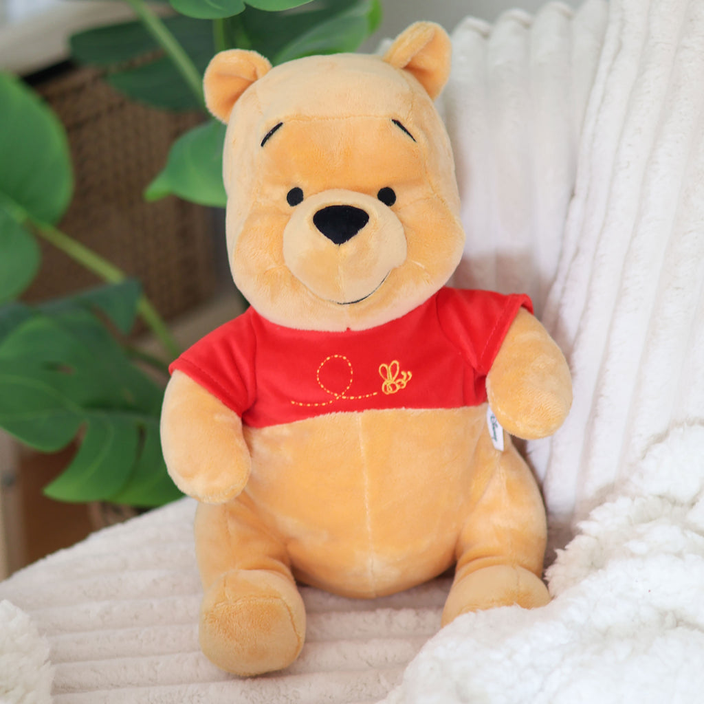 Imagen del producto Winnie Pooh - Figura de peluche sentada 30 cm