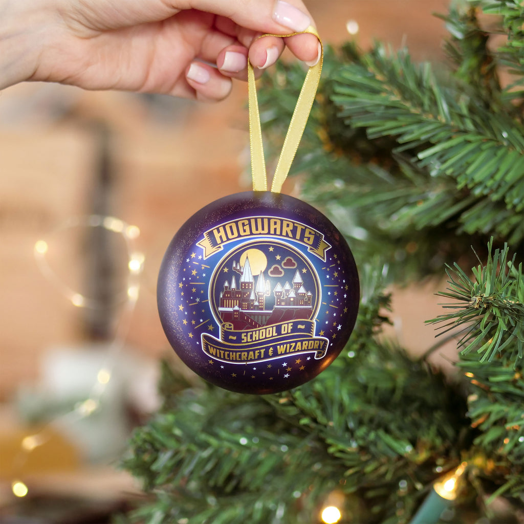 Imagen del producto Harry Potter - Bola de Navidad de la Escuela de Magia y Hechicería de Hogwarts con Collar