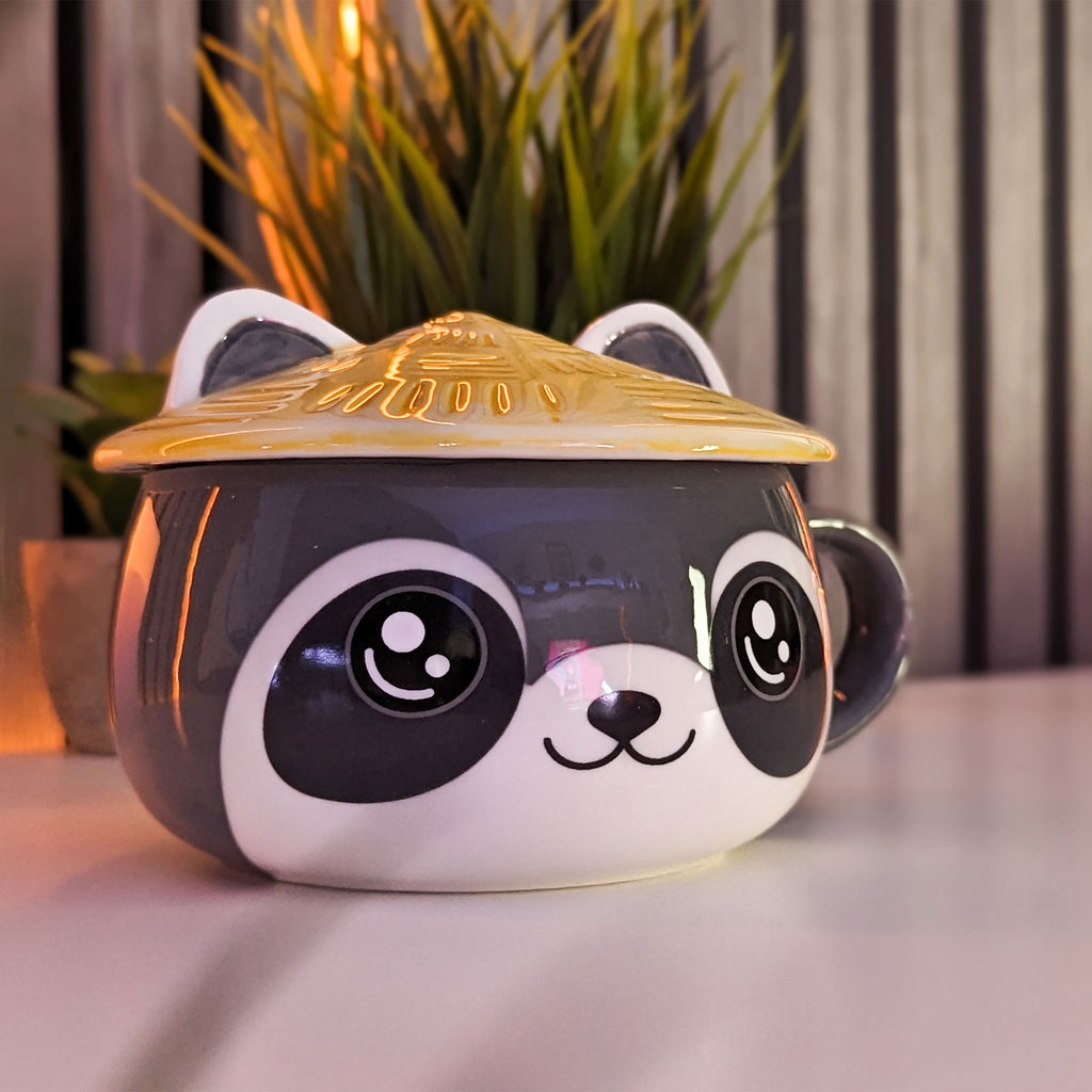 Imagen del producto Taza Kawaii de Mapache con tapa para fans del Anime