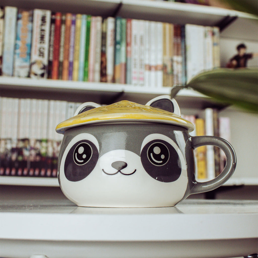 Imagen del producto Taza Kawaii de Mapache con tapa para fans del Anime