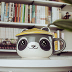 Imagen del producto Taza Kawaii de Mapache con tapa para fans del Anime