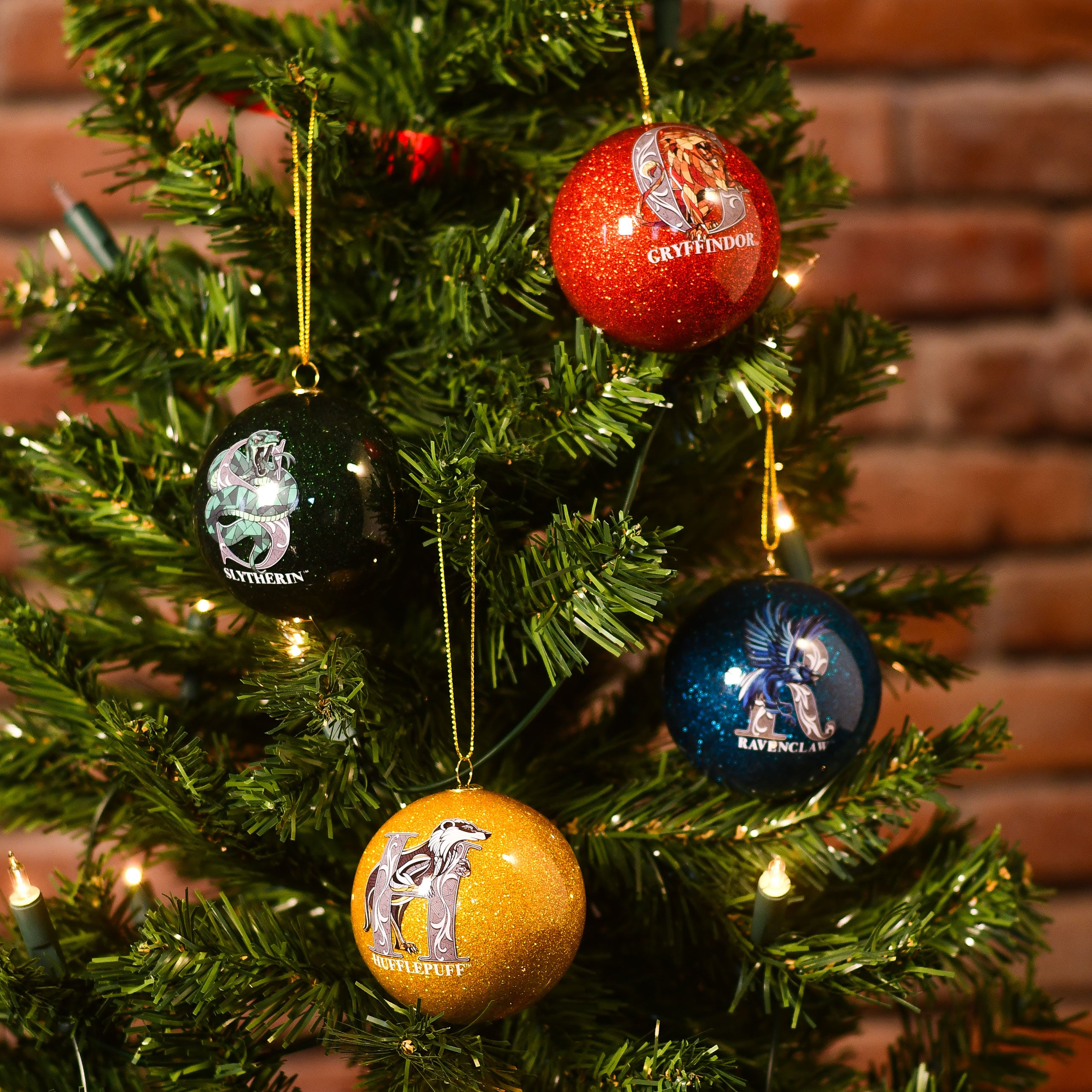 Imagen del producto Harry Potter - Adornos de Navidad de los escudos de las casas, conjunto de 4