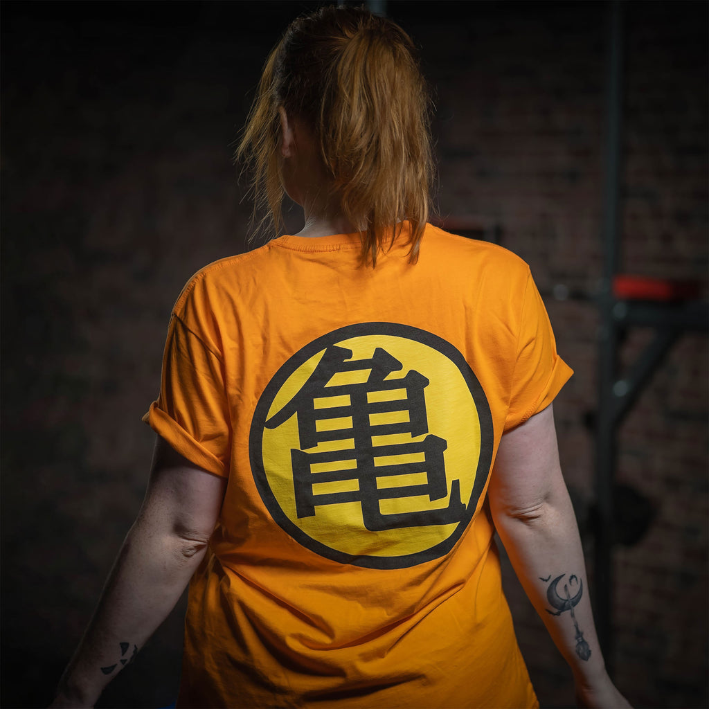 Imagen del producto Dragon Ball - Camiseta naranja con símbolo Kame