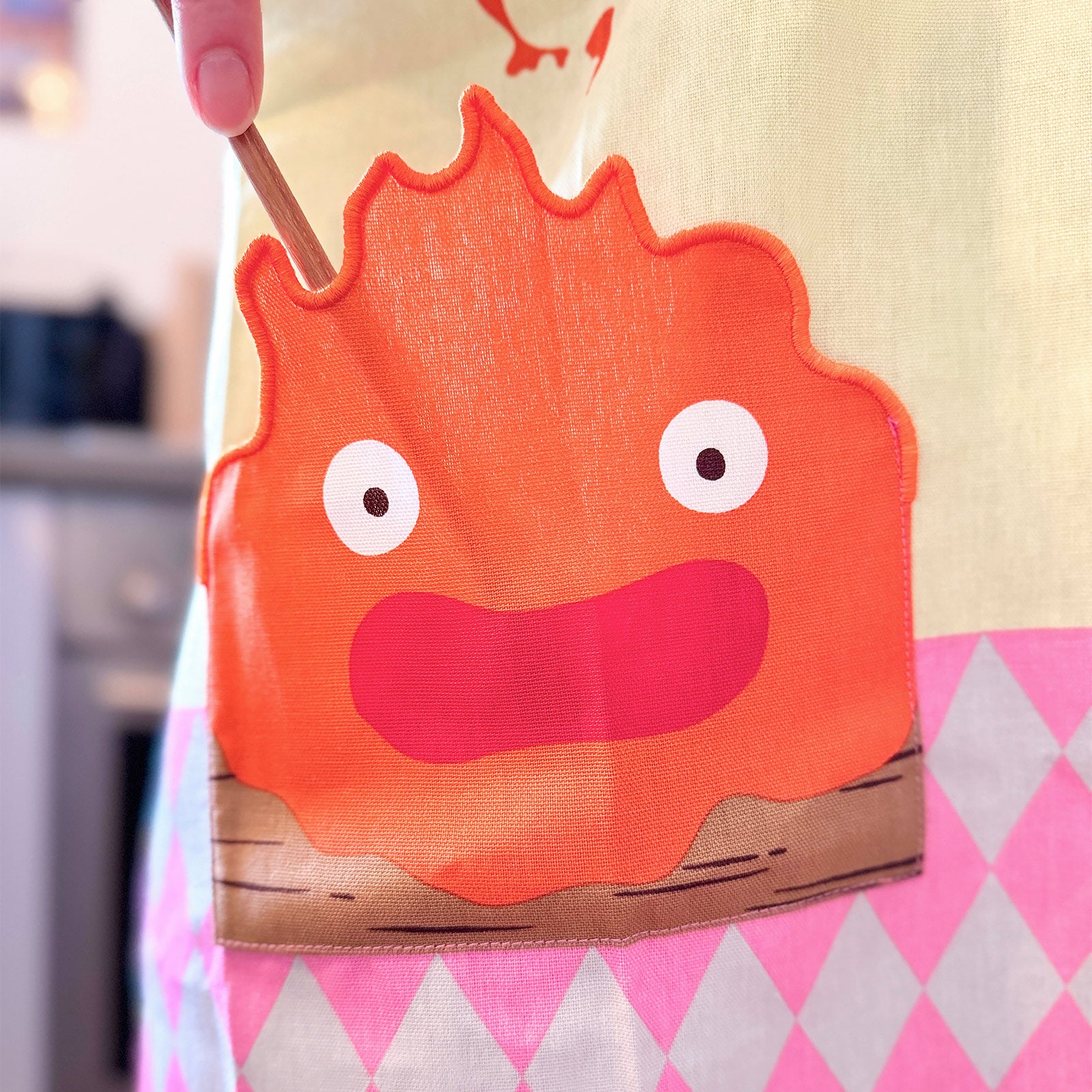 Imagen del producto El castillo ambulante - Delantal Calcifer