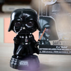 Imagen del producto Figura Funko Pop de Darth Vader con cabeza oscilante, luz y sonido - Star Wars