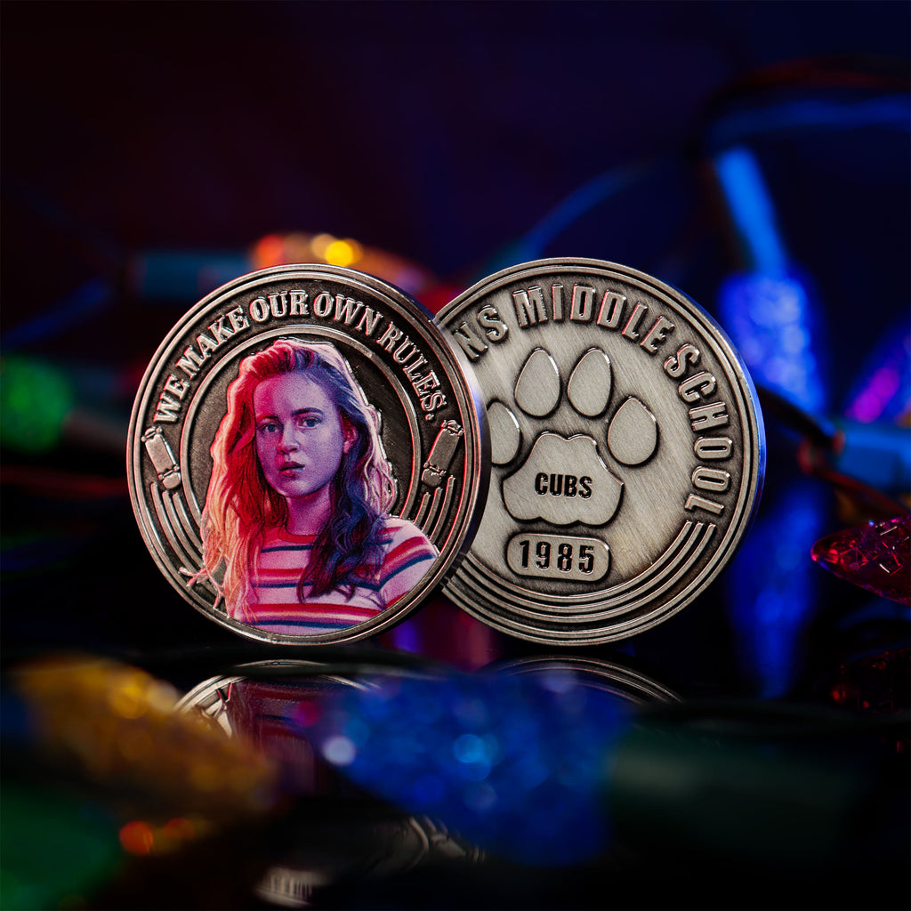 Imagen del producto Stranger Things - Álbum de monedas coleccionables de Hawkins Middle School