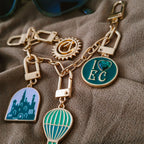 Imagen del producto Wicked - Maleta Emerald City con pulsera de charms