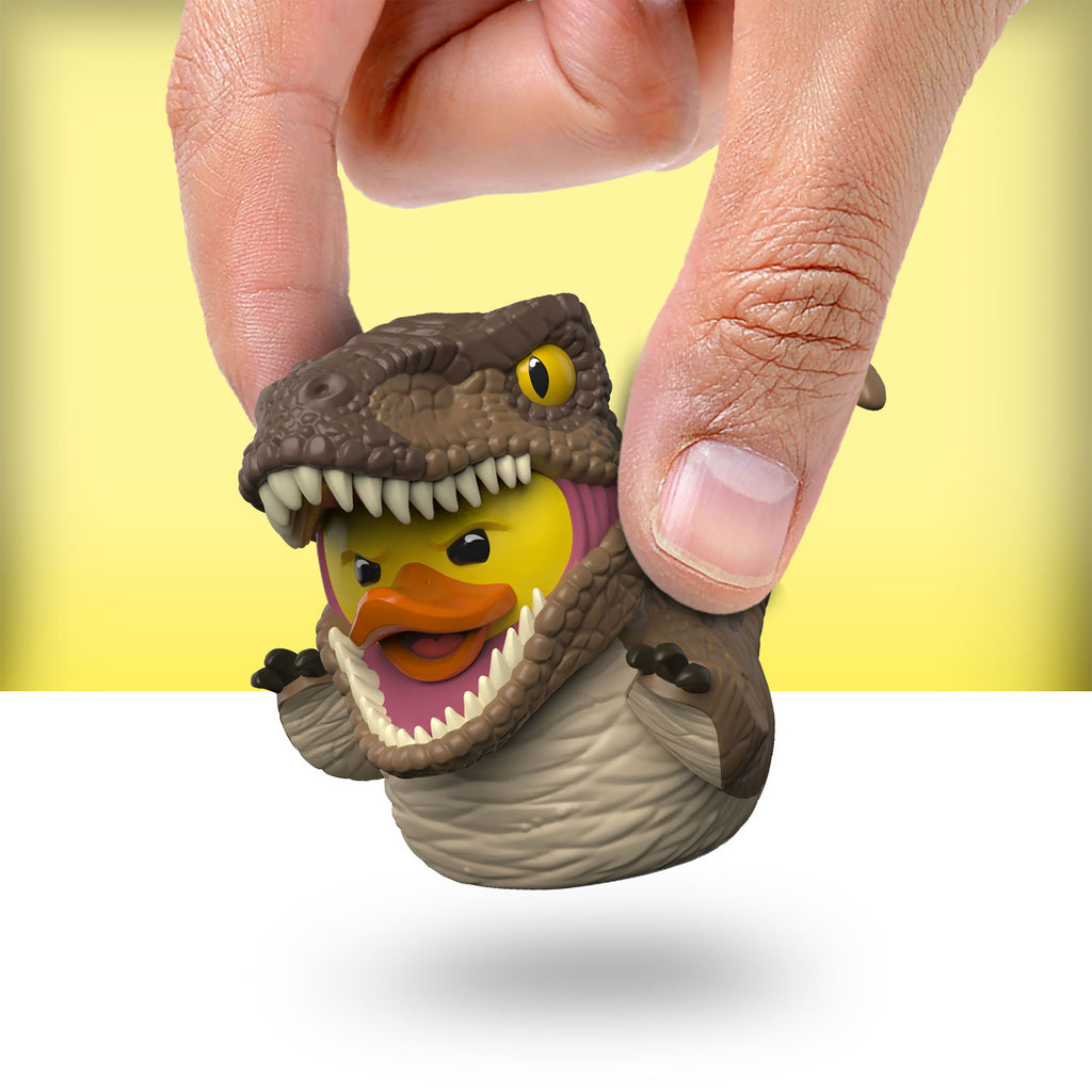 Imagen del producto Jurassic Park - Pato decorativo Velociraptor Mini TUBBZ