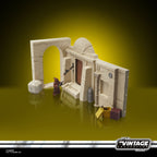 Imagen del producto Star Wars Episodio IV Vintage Collection Playset Streets of Mos Eisley con figura de acción Jawa