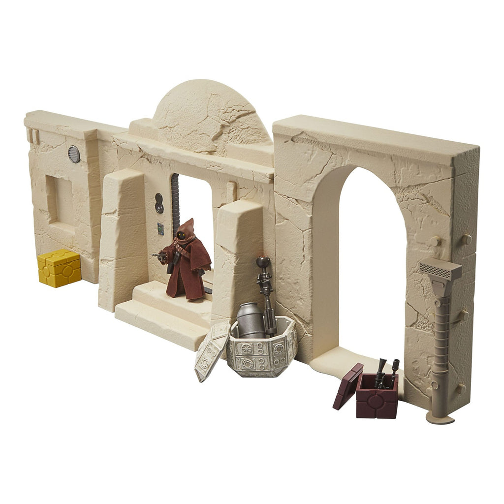 Imagen del producto Star Wars Episodio IV Vintage Collection Playset Streets of Mos Eisley con figura de acción Jawa