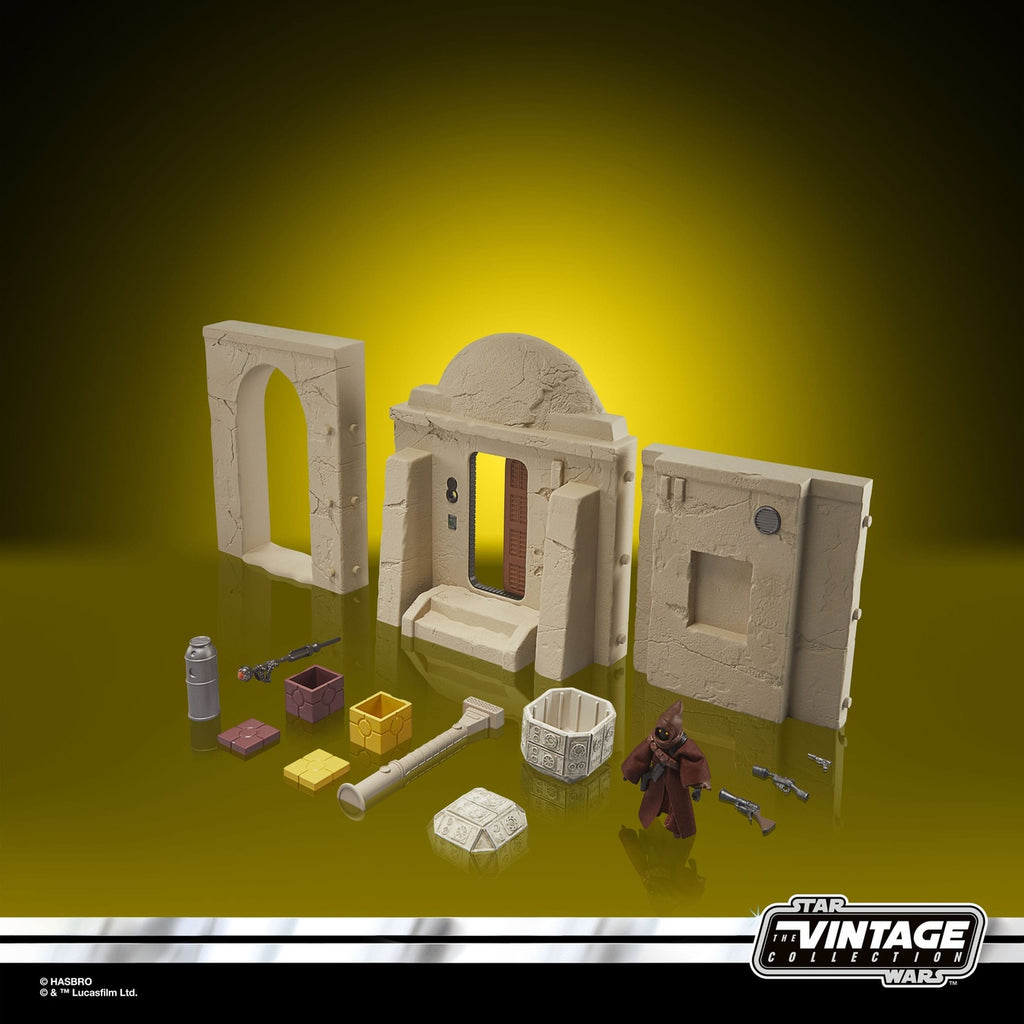 Imagen del producto Star Wars Episodio IV Vintage Collection Playset Streets of Mos Eisley con figura de acción Jawa