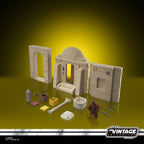 Imagen del producto Star Wars Episodio IV Vintage Collection Playset Streets of Mos Eisley con figura de acción Jawa