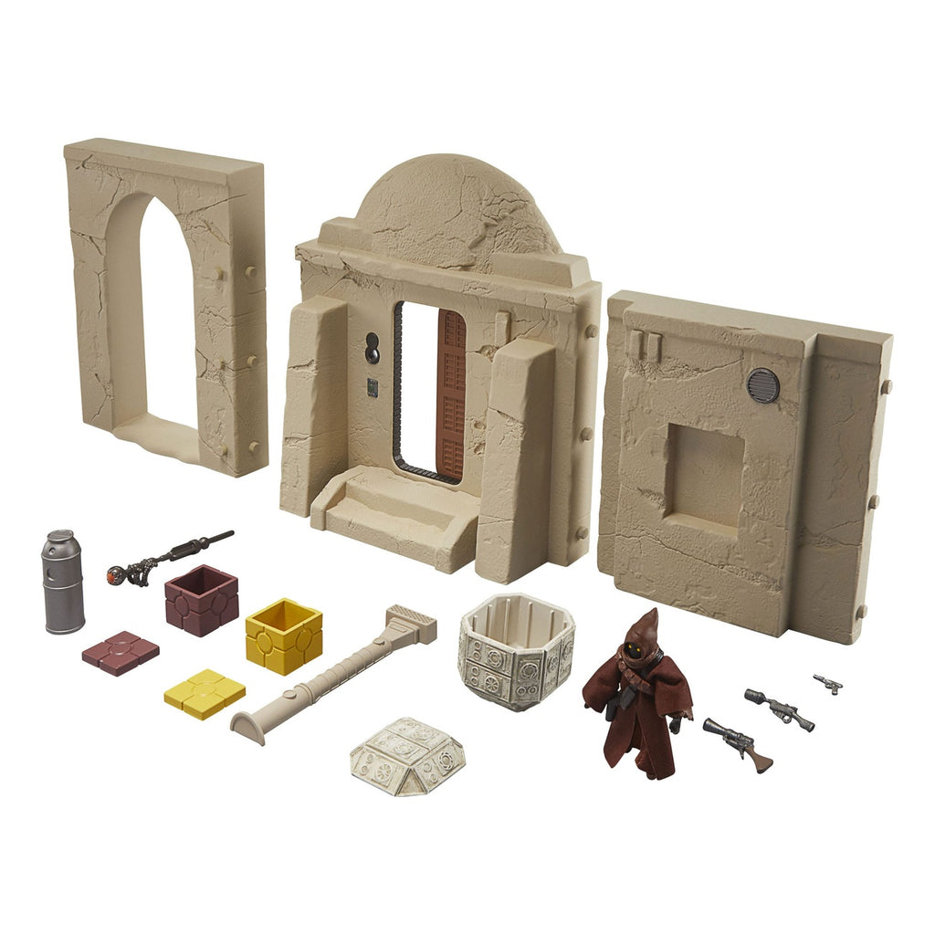 Imagen del producto Star Wars Episodio IV Vintage Collection Playset Streets of Mos Eisley con figura de acción Jawa