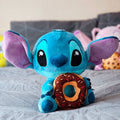 Imagen del producto Lilo & Stitch peluche Stitch con donut 25 cm