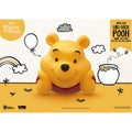 Imagen del producto Winnie the Pooh Hucha pequeña de vinilo Winnie tumbado 17 cm