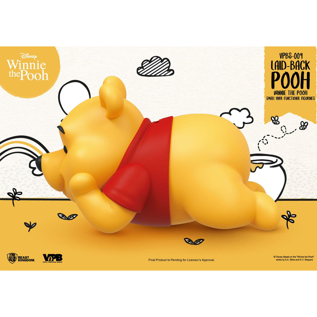 Imagen del producto Winnie the Pooh Hucha pequeña de vinilo Winnie tumbado 17 cm