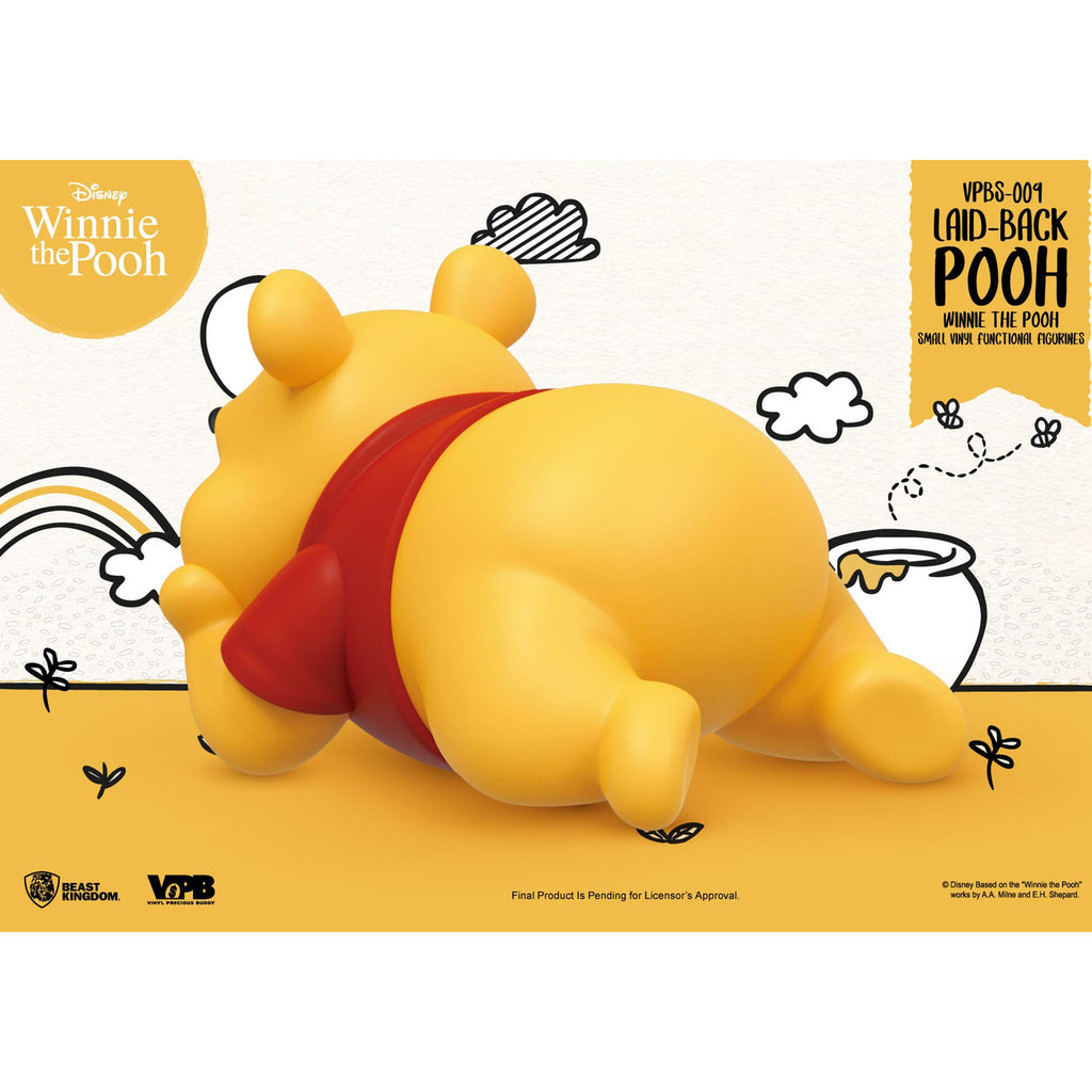 Imagen del producto Winnie the Pooh Hucha pequeña de vinilo Winnie tumbado 17 cm