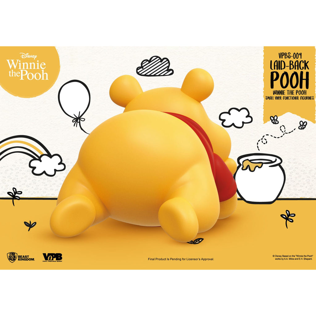 Imagen del producto Winnie the Pooh Hucha pequeña de vinilo Winnie tumbado 17 cm
